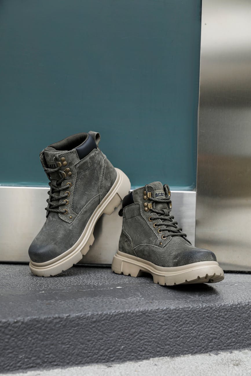 stylish grey leather boots on urban display